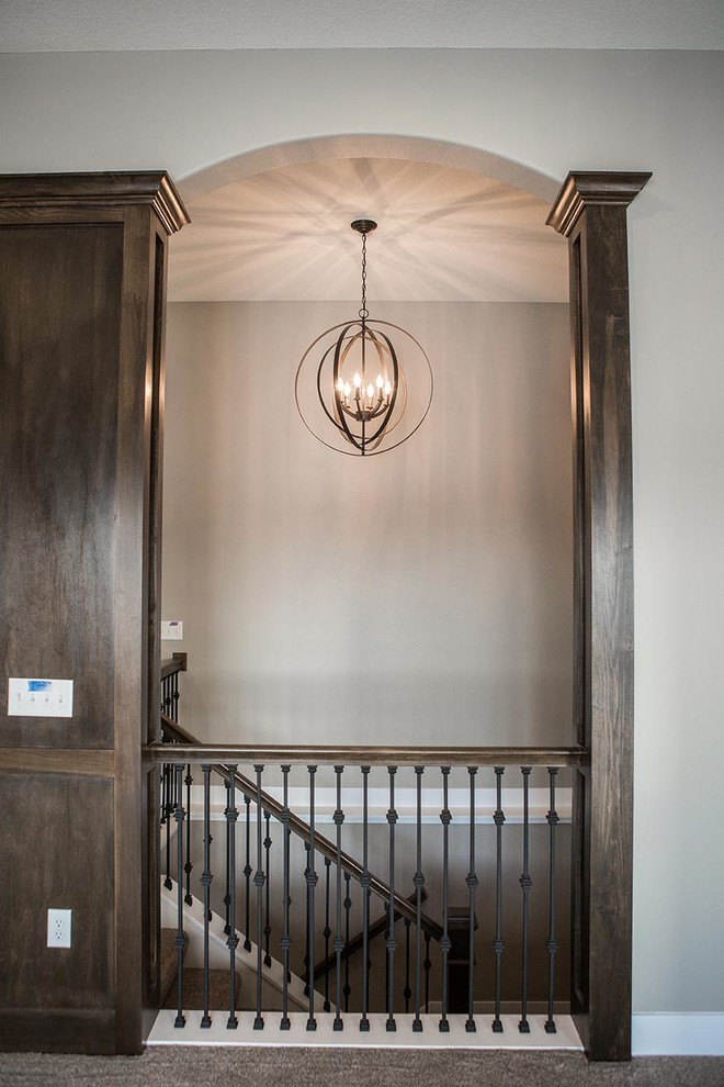 Inspiration for a transitional staircase remodel in Cedar Rapids