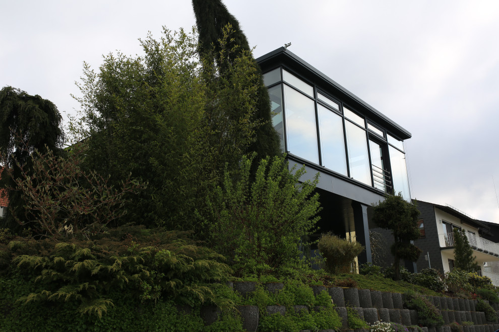 Großer Moderner Wintergarten mit Glasdecke in Sonstige