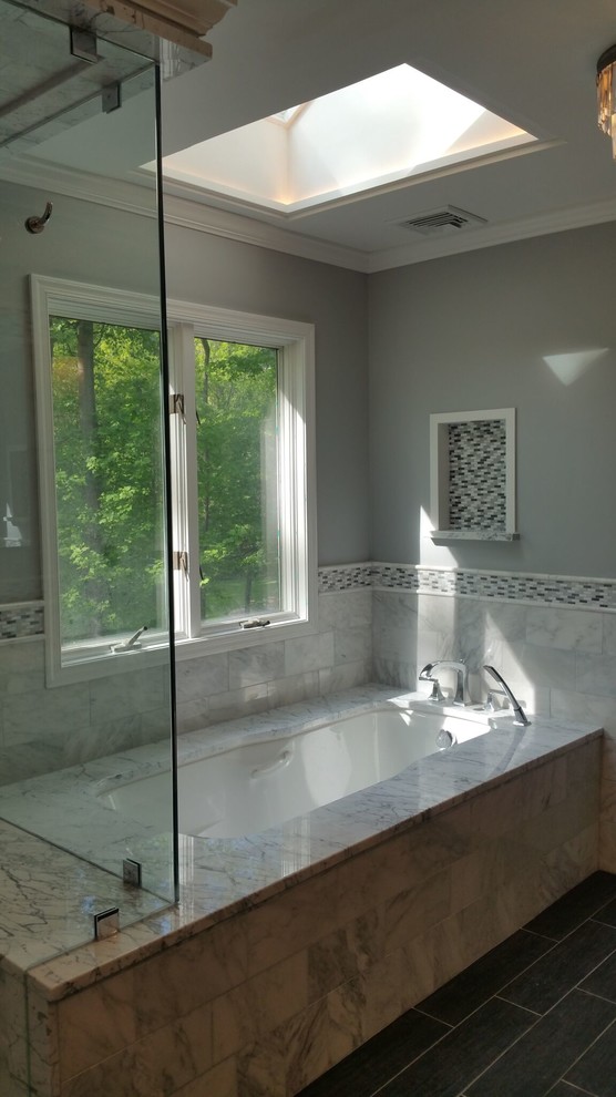 Photo of a mid-sized transitional bathroom in New York with an alcove shower, gray tile, white tile, marble, grey walls and slate floors.