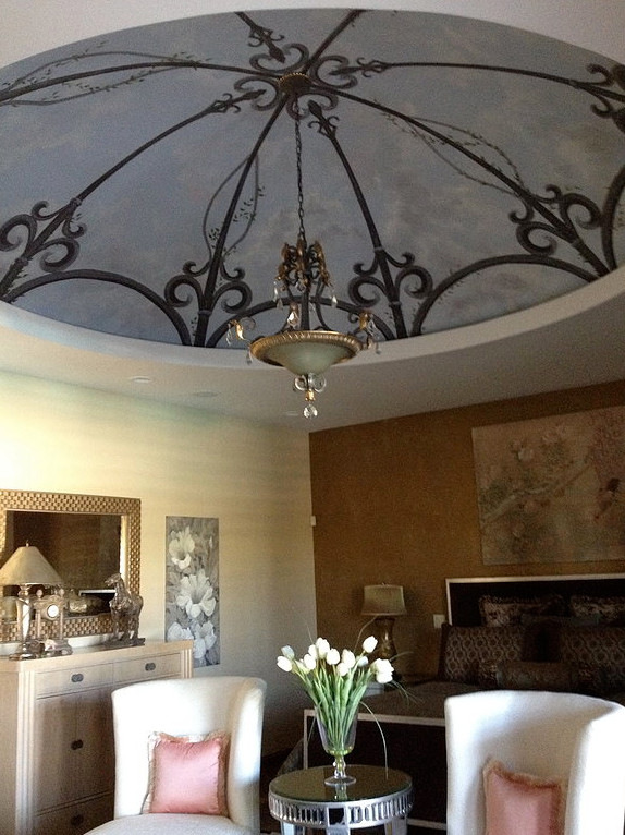 Inspiration for a large transitional master travertine floor bedroom remodel in Phoenix with white walls and no fireplace