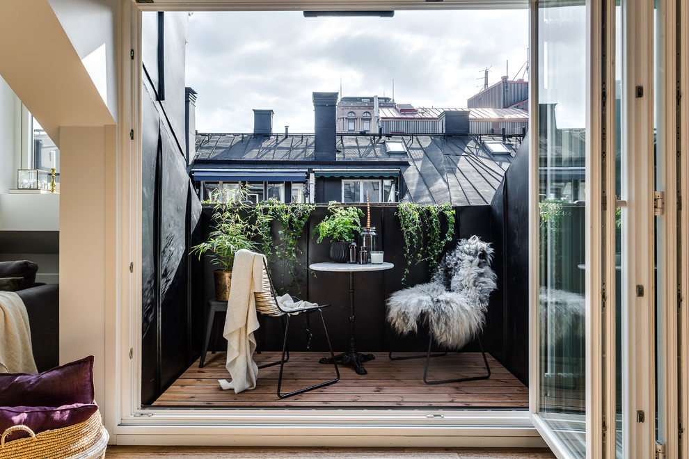 Inspiration for a mid-sized scandinavian balcony in Stockholm with no cover.