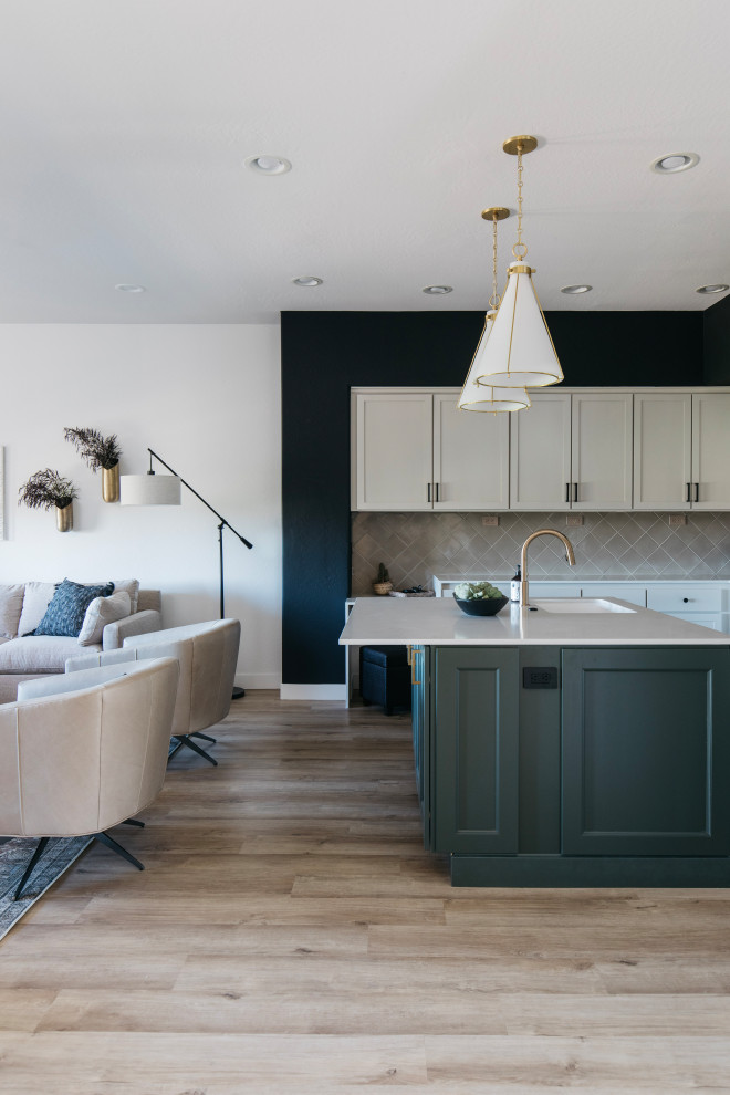 Example of a transitional home design design in Phoenix