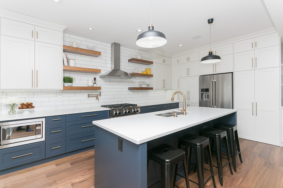 Design ideas for a transitional kitchen in Calgary.