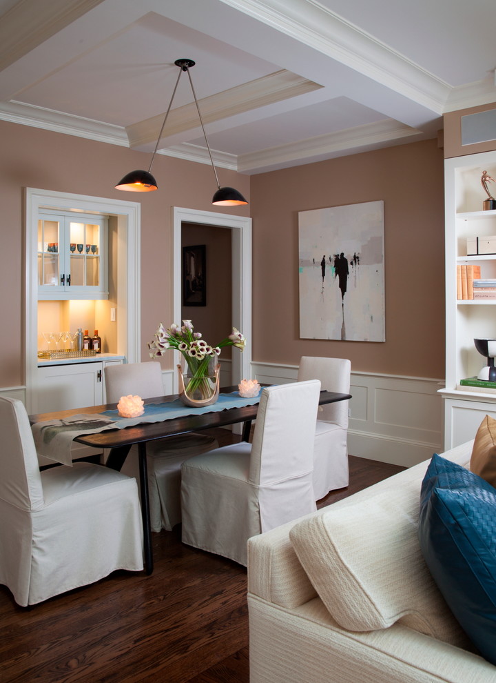 This is an example of a mid-sized transitional open plan dining in New York with beige walls and dark hardwood floors.
