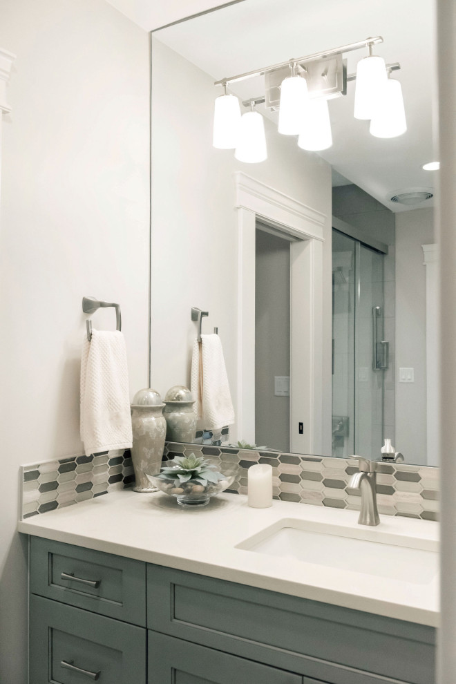 Transitional home design photo in Denver