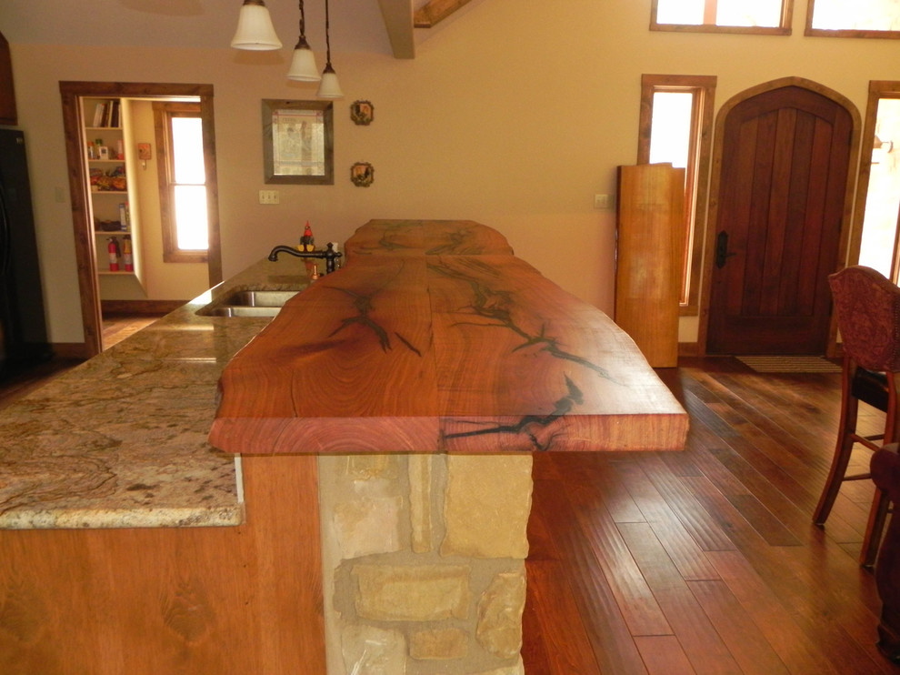 Example of a mountain style kitchen design in Austin