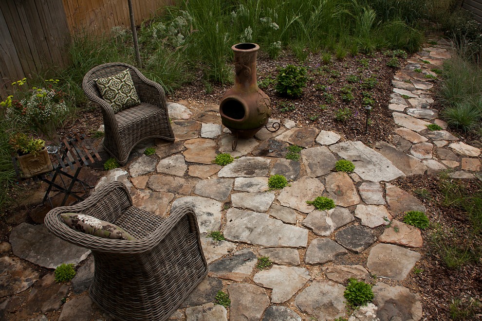 Design ideas for an arts and crafts patio in Birmingham with natural stone pavers and no cover.
