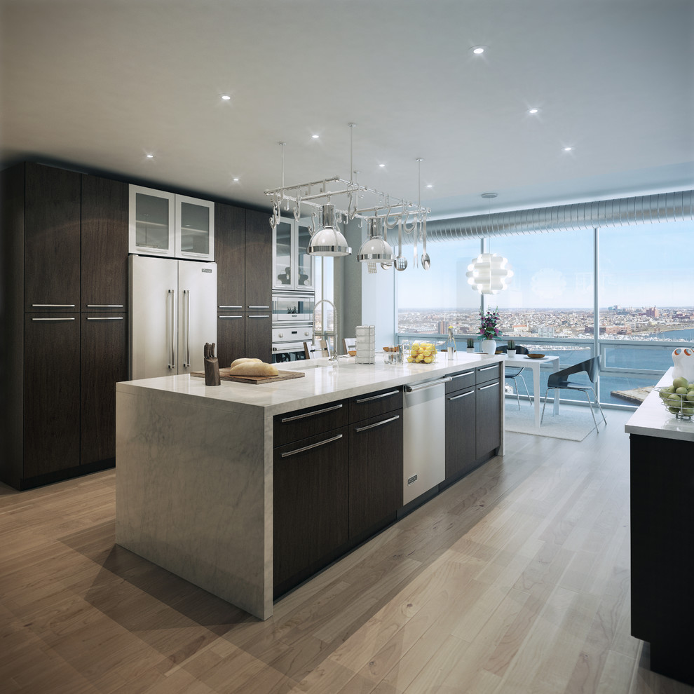 Inspiration for a contemporary eat-in kitchen in Baltimore with an undermount sink, flat-panel cabinets, dark wood cabinets, stainless steel appliances, light hardwood floors and multiple islands.