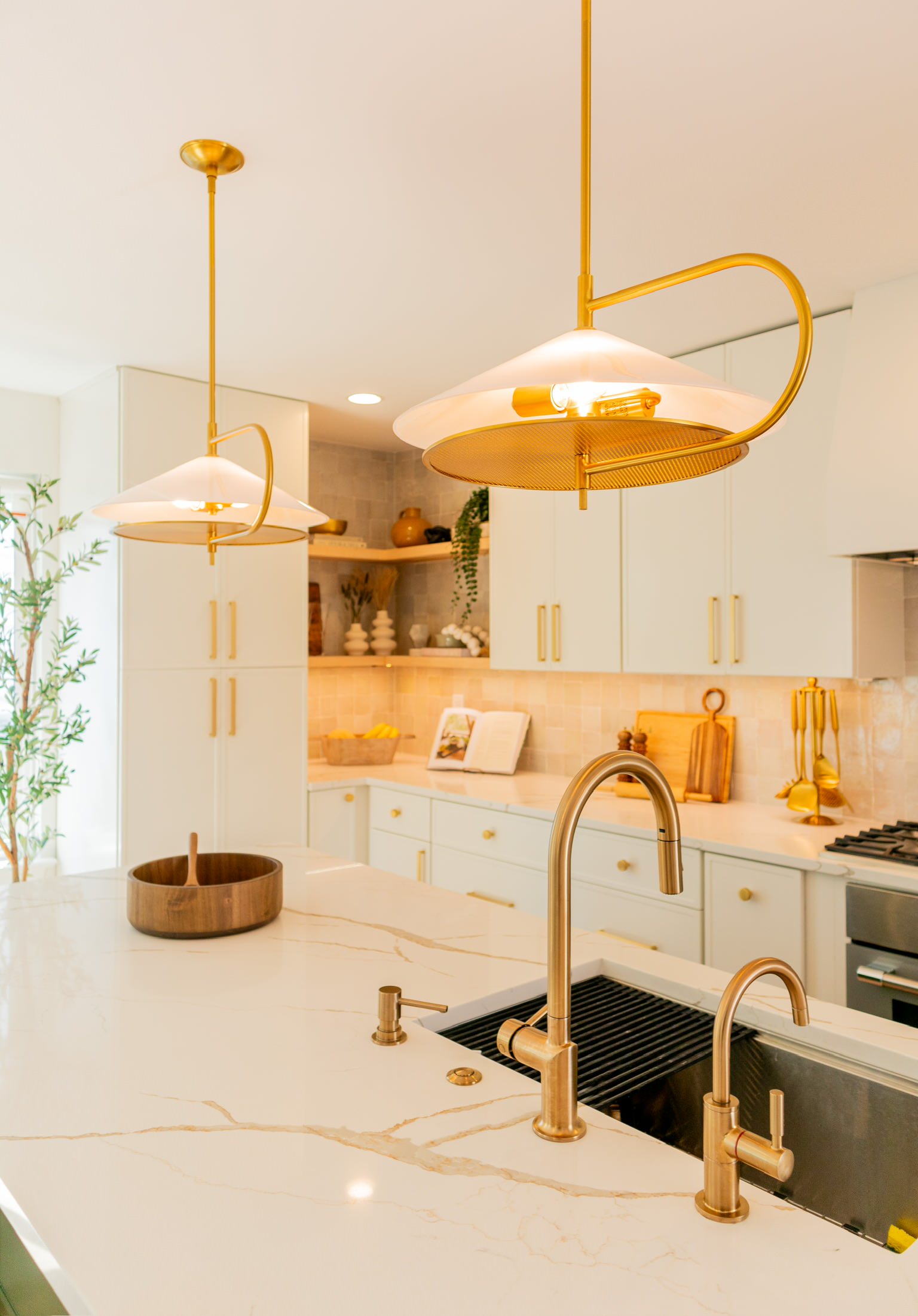 There are so many beautiful details to appreciate in this transitional/contemporary kitchen. We knocked down 3 walls to create a fully open-concept kitchen with the living and dining room. This really