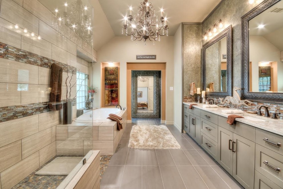 Inspiration for a large traditional master bathroom in Austin with shaker cabinets, grey cabinets, a drop-in tub, a curbless shower, beige tile, matchstick tile, beige walls, slate floors, an undermount sink, marble benchtops, grey floor, an open shower and white benchtops.