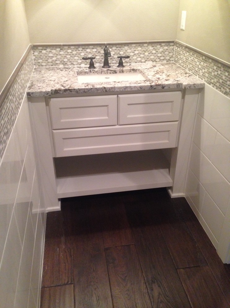 Inspiration for a transitional gray tile and mosaic tile porcelain tile bathroom remodel in Seattle with an undermount sink, shaker cabinets, white cabinets and quartz countertops