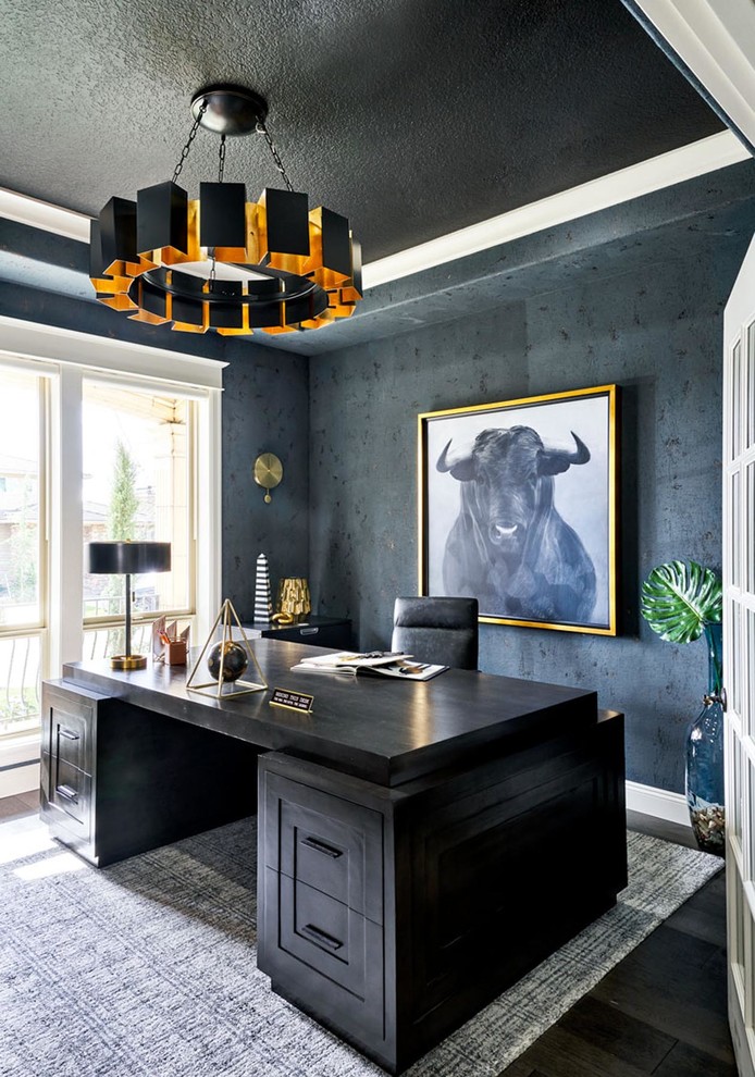 Inspiration for a transitional study room in Portland with a freestanding desk and blue walls.