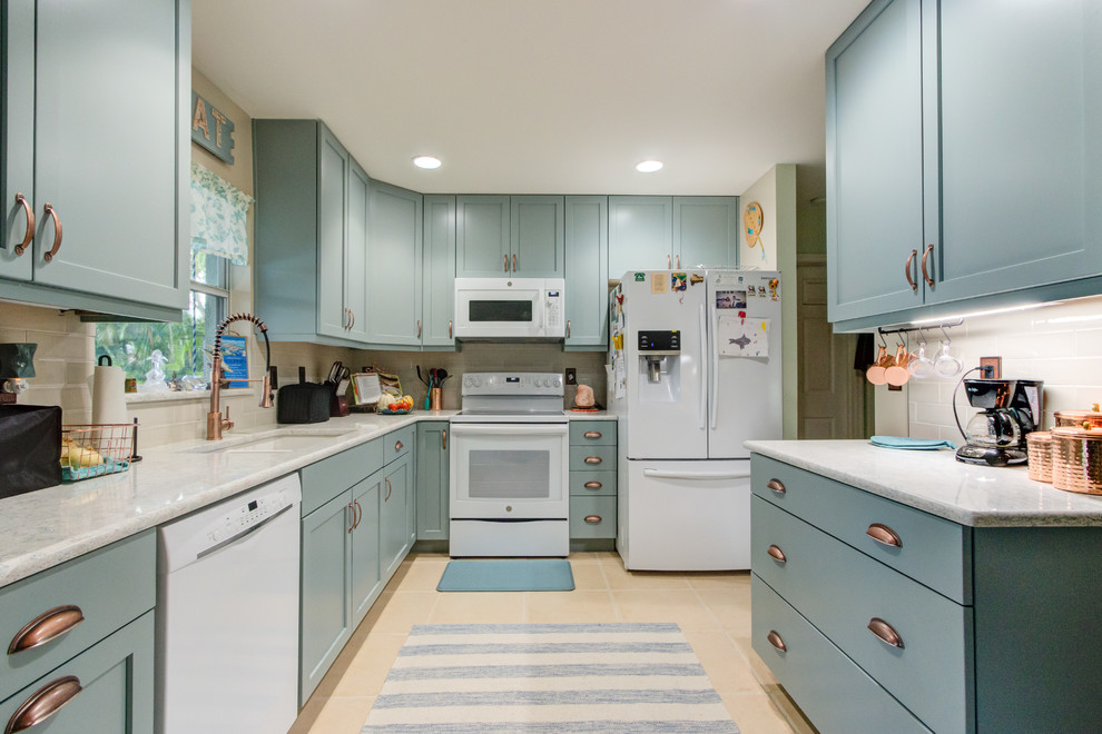 Inspiration for a small eclectic u-shaped separate kitchen in Other with an undermount sink, shaker cabinets, turquoise cabinets, quartz benchtops, beige splashback, white appliances and turquoise benchtop.