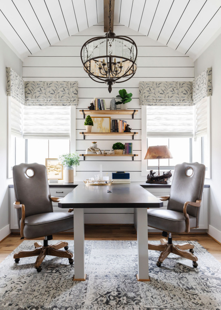 Inspiration for a rustic home office in Houston.