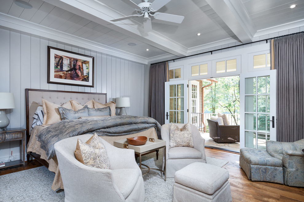Inspiration for a country master bedroom in Other with grey walls and medium hardwood floors.