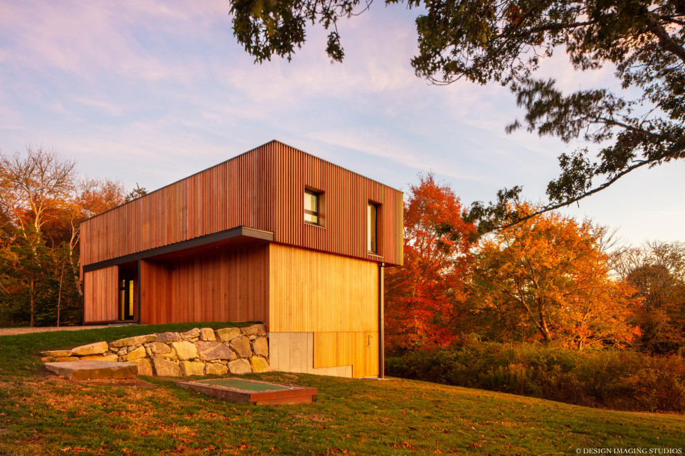 Photo of a modern house exterior in Boston with wood cladding.
