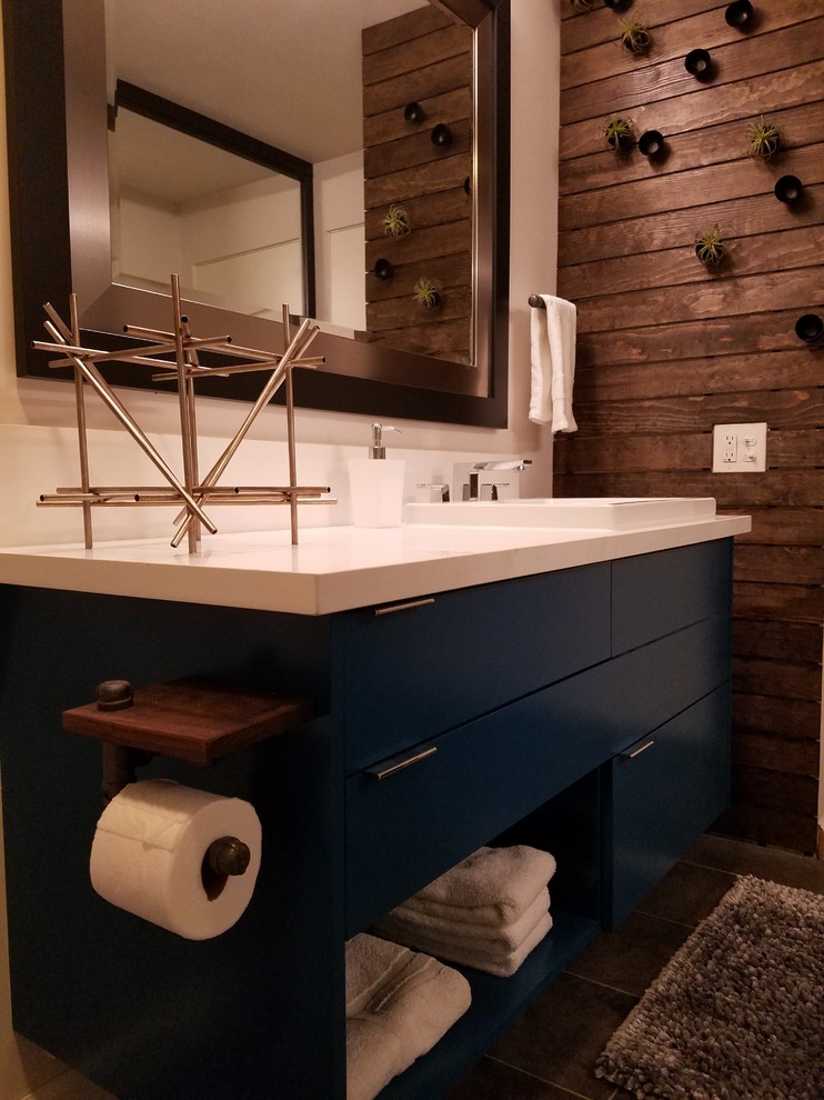 Inspiration for a mid-sized contemporary master bathroom in Los Angeles with flat-panel cabinets, turquoise cabinets, an alcove shower, a two-piece toilet, white tile, mosaic tile, white walls, porcelain floors, a vessel sink, engineered quartz benchtops, grey floor and a hinged shower door.