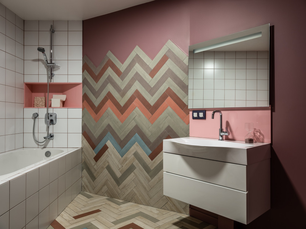 This is an example of a large contemporary kids bathroom in Moscow with flat-panel cabinets, white cabinets, an undermount tub, a one-piece toilet, pink tile, porcelain tile, pink walls, ceramic floors, a drop-in sink, turquoise floor, white benchtops, a single vanity and a floating vanity.