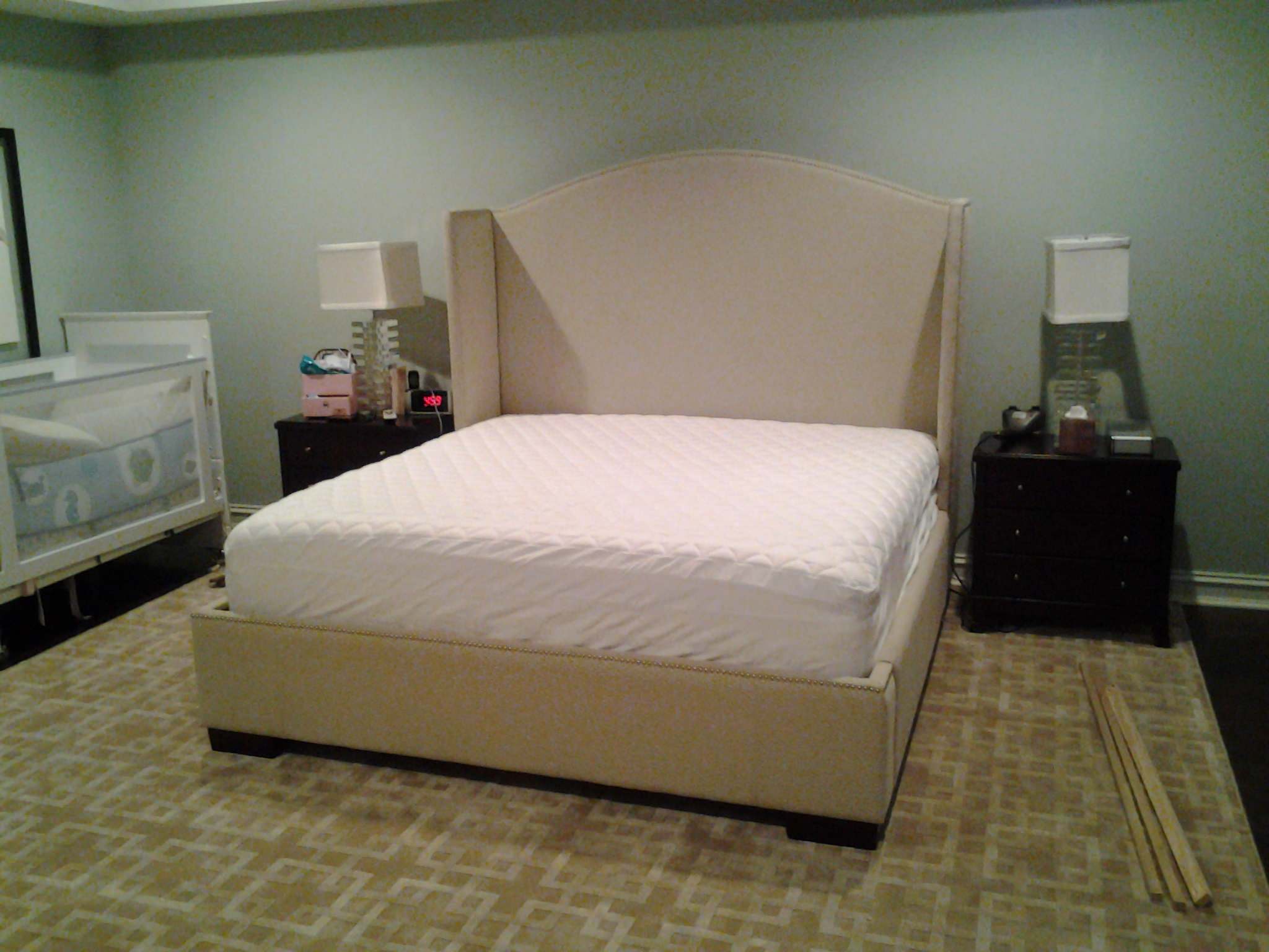Upholstered bed with nail heads