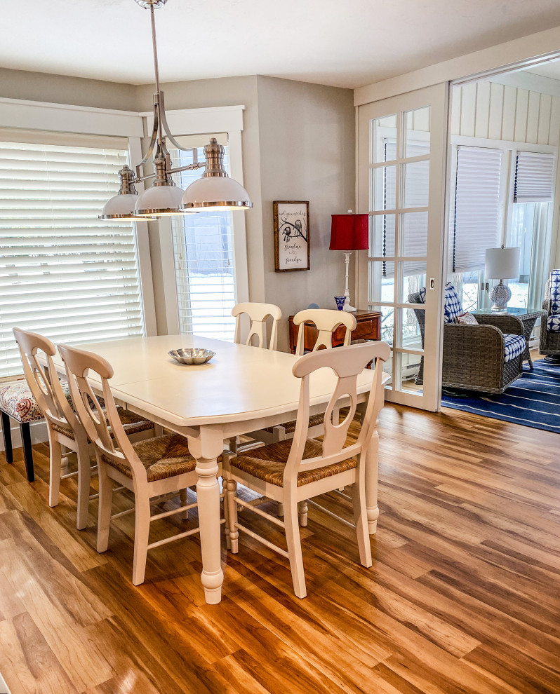 Photo of a beach style dining room in Other.