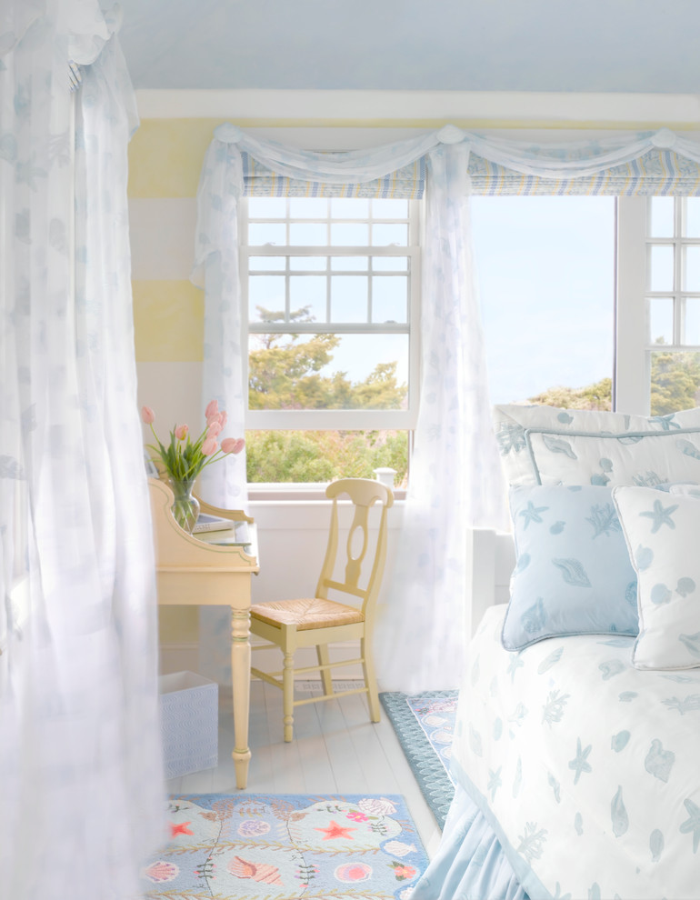 Example of a beach style bedroom design in Boston