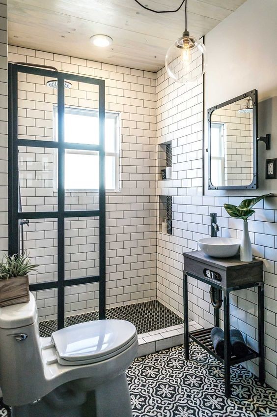 Photo of a mid-sized industrial 3/4 bathroom in Orange County with flat-panel cabinets, grey cabinets, an alcove shower, a two-piece toilet, white tile, porcelain tile, white walls, porcelain floors, a vessel sink, wood benchtops, multi-coloured floor and an open shower.