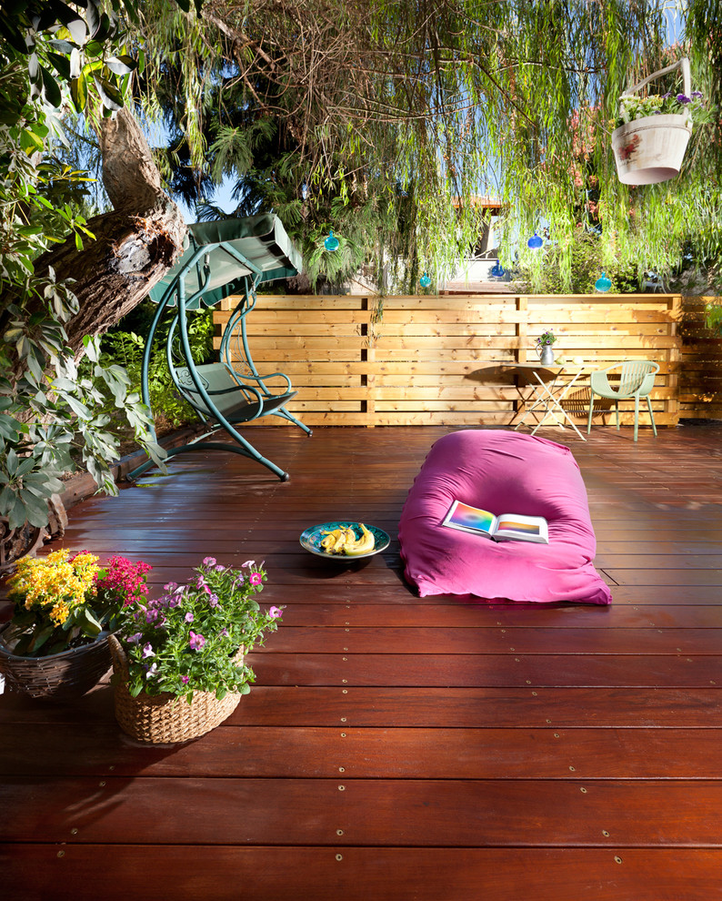 Photo of an eclectic deck in Other with no cover.