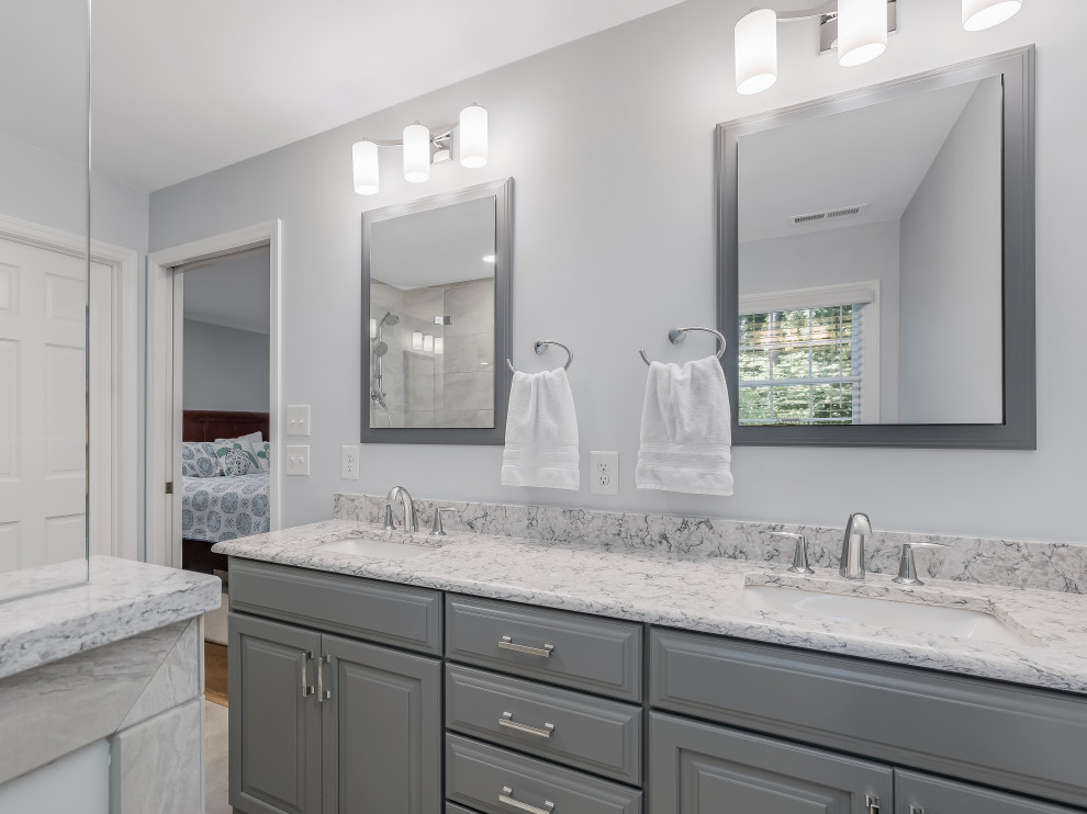 Large traditional master bathroom in Raleigh with raised-panel cabinets, a corner shower, an undermount sink, engineered quartz benchtops, an open shower, a niche, a double vanity and a built-in vanity.