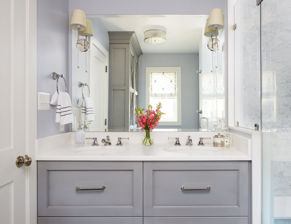 Mid-sized transitional master bathroom in DC Metro with recessed-panel cabinets, grey cabinets, an alcove shower, a one-piece toilet, gray tile, mosaic tile, grey walls, marble floors, an undermount sink, quartzite benchtops, grey floor, a hinged shower door and white benchtops.