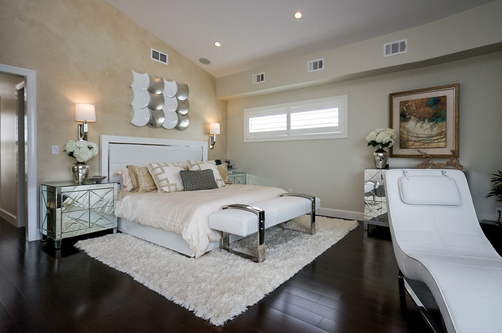 Design ideas for a contemporary bedroom in Jacksonville with beige walls and dark hardwood floors.
