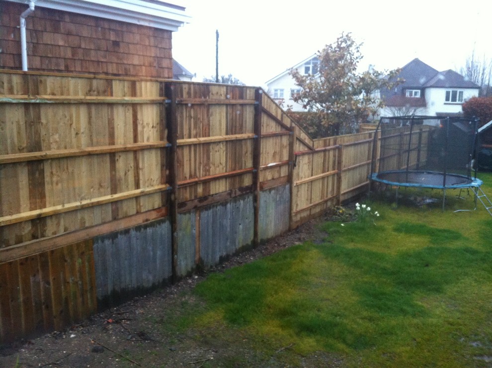 How to disguise tall fence