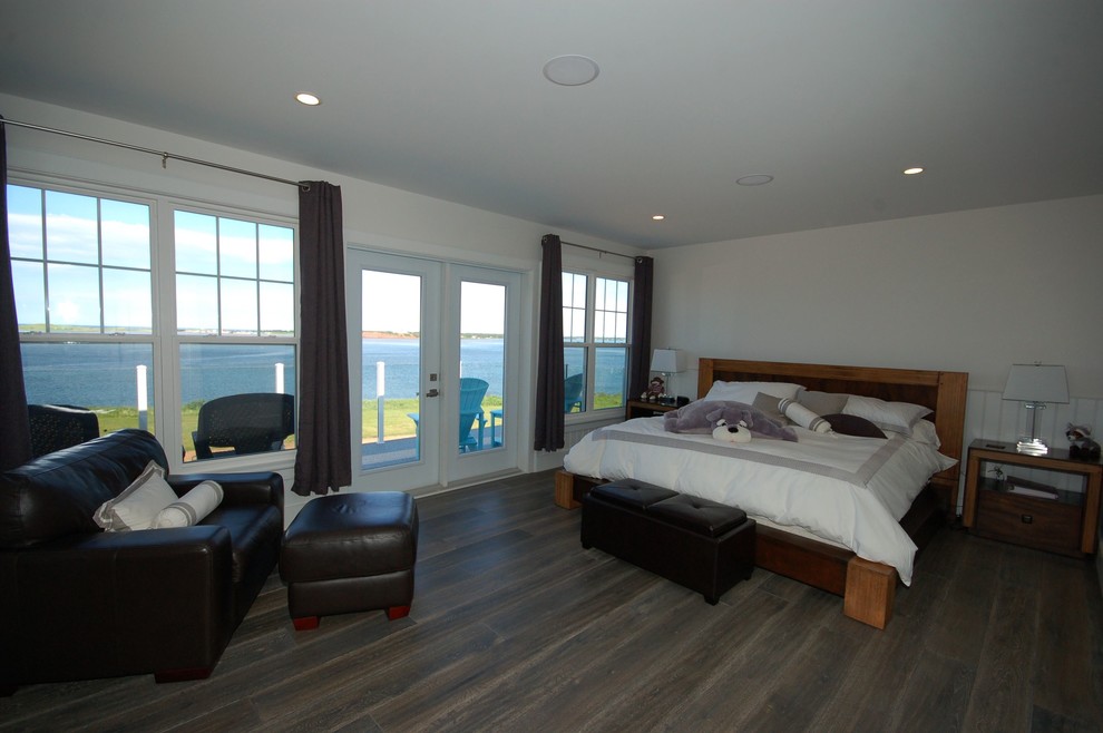 Bedroom - large transitional master dark wood floor and brown floor bedroom idea with white walls