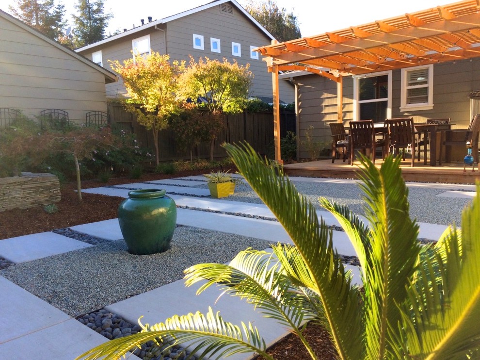 Mid-sized asian backyard full sun xeriscape in San Francisco with gravel.
