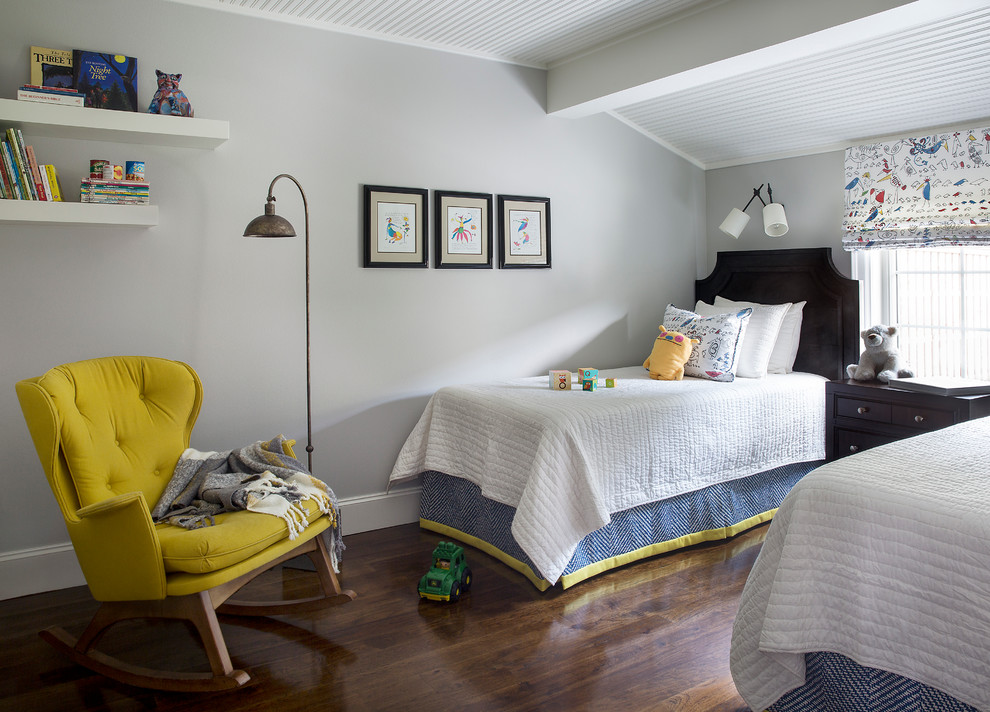 This is an example of a mid-sized transitional gender-neutral kids' bedroom for kids 4-10 years old in Charleston with grey walls, dark hardwood floors and brown floor.