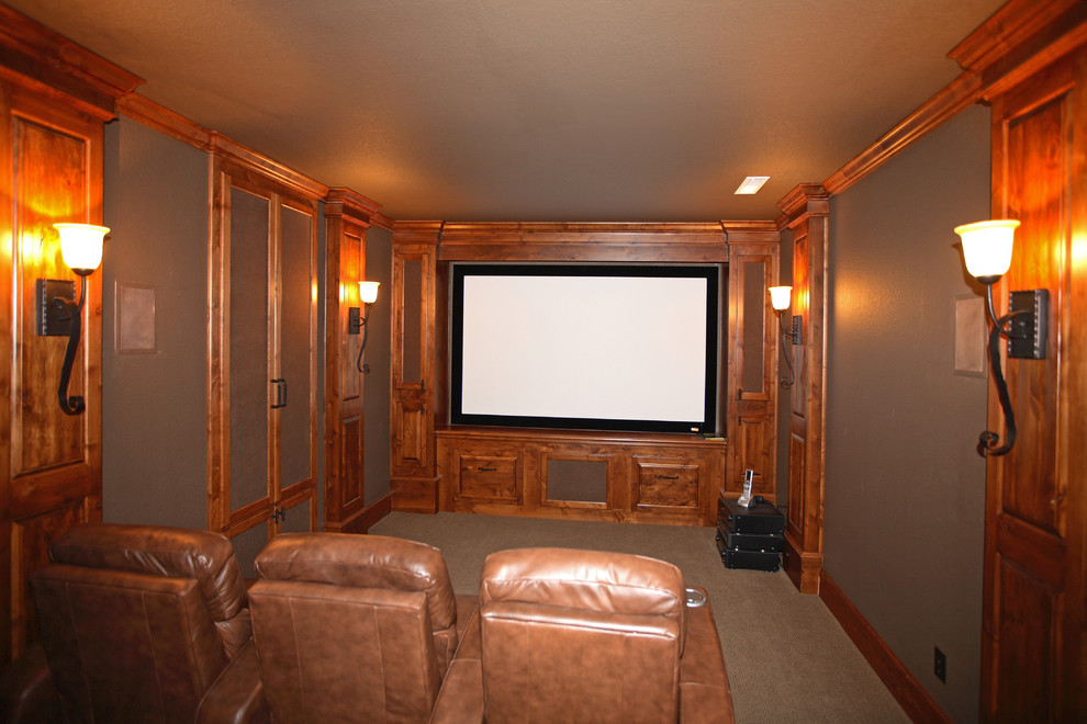 Photo of a traditional home theatre in Portland.