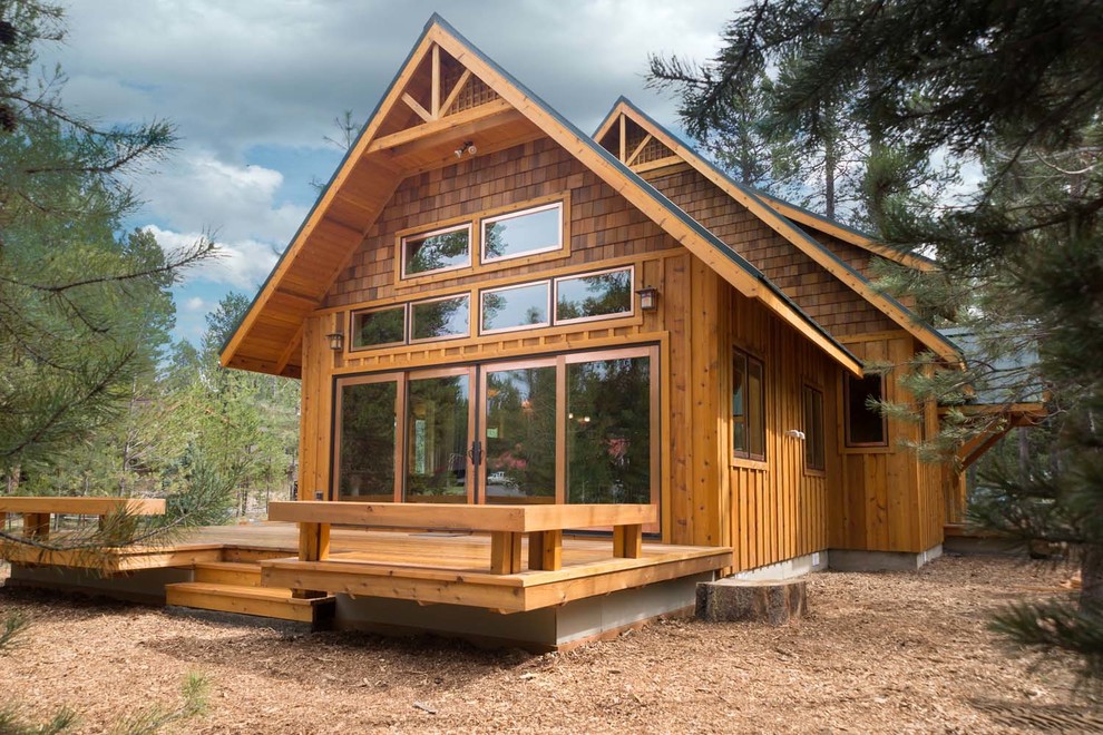 Inspiration for a large craftsman backyard deck remodel with no cover