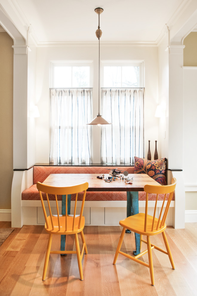 Design ideas for a transitional dining room in Boston with white walls.