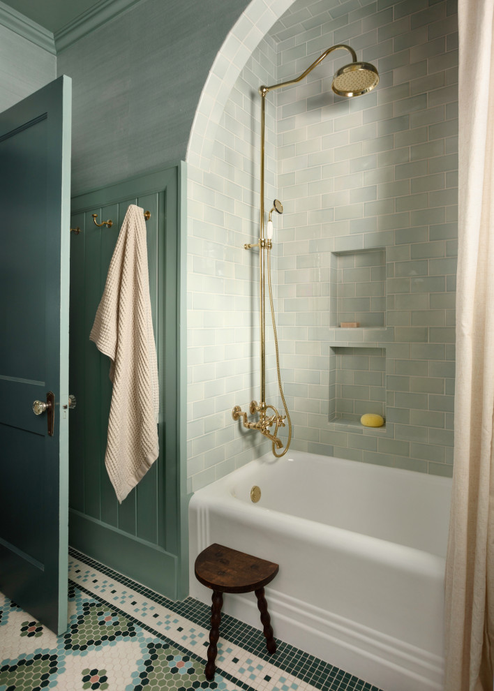 Inspiration for a mid-sized transitional bathroom in Other with a shower/bathtub combo, blue tile, ceramic tile, mosaic tile floors and multi-coloured floor.