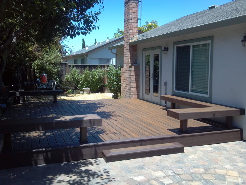 Design ideas for a mid-sized traditional backyard patio in San Diego with decking and no cover.
