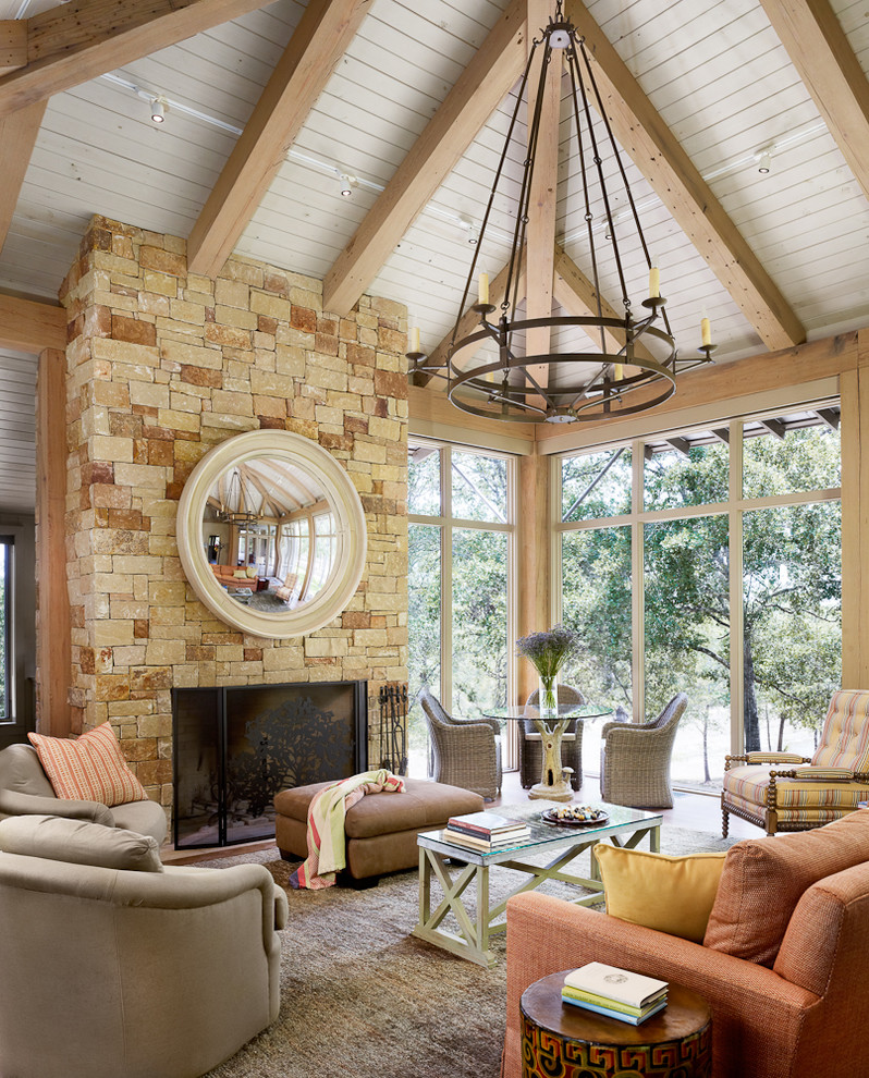 This is an example of a mid-sized traditional sunroom in Houston with a stone fireplace surround, a standard ceiling and a standard fireplace.