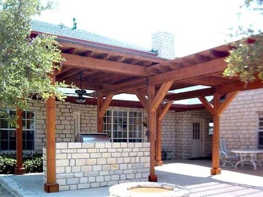 Photo of a country patio in Austin with a pergola.
