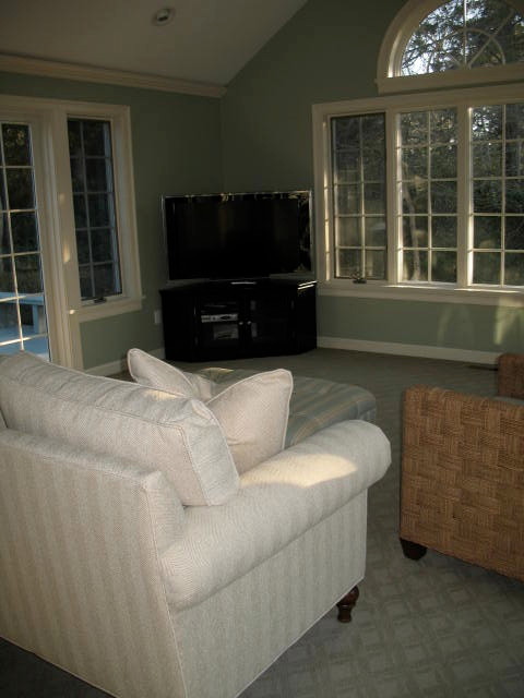 Photo of a beach style family room in Boston.