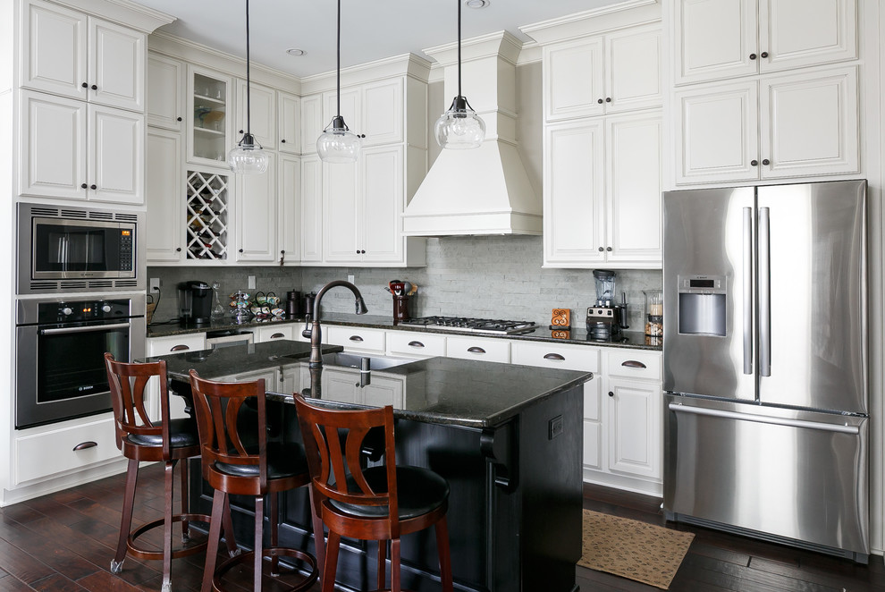 This is an example of a transitional kitchen in Louisville.