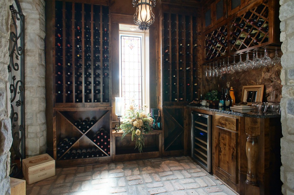 Inspiration for a mediterranean wine cellar in Dallas.