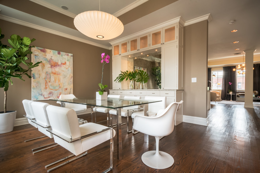 Inspiration for a contemporary dining room in New York with brown walls and dark hardwood floors.