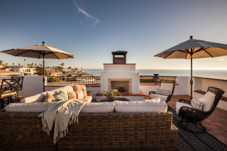Tour a Spanish Colonial-Style Beach Home With Amazing Ocean Views (one photo)
