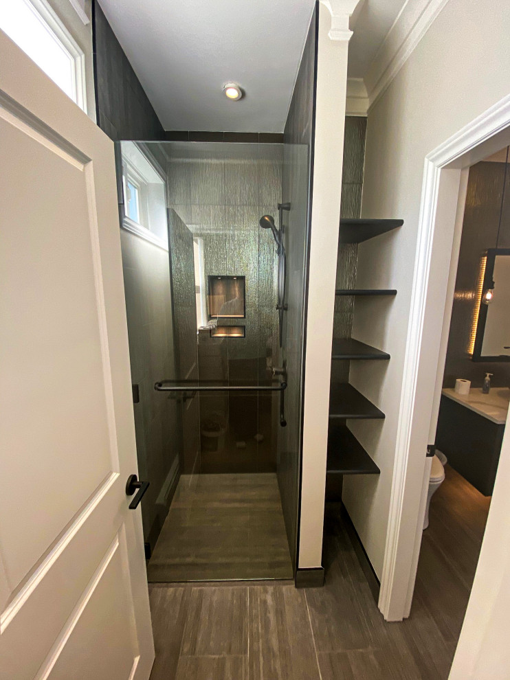 Example of a transitional home design design in Vancouver