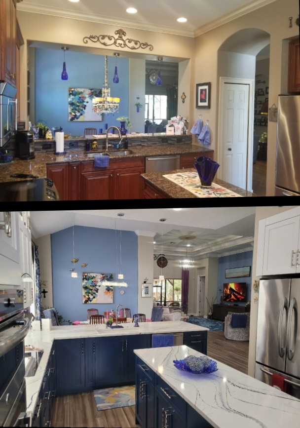 This is an example of a mid-sized kitchen in Tampa with an undermount sink, shaker cabinets, blue cabinets, quartz benchtops, blue splashback, mosaic tile splashback, stainless steel appliances, bamboo floors, with island, grey floor and blue benchtop.