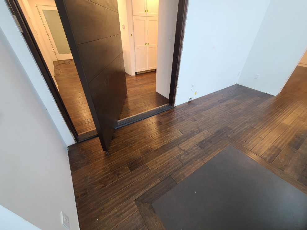 Sleek Engineered Hardwood & Modern Sliding Door by I’m The Man Services