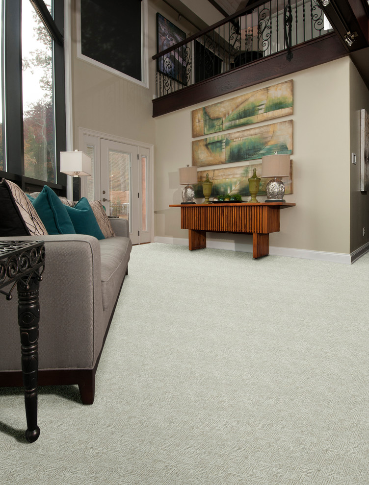 Traditional living room in Orange County with carpet.